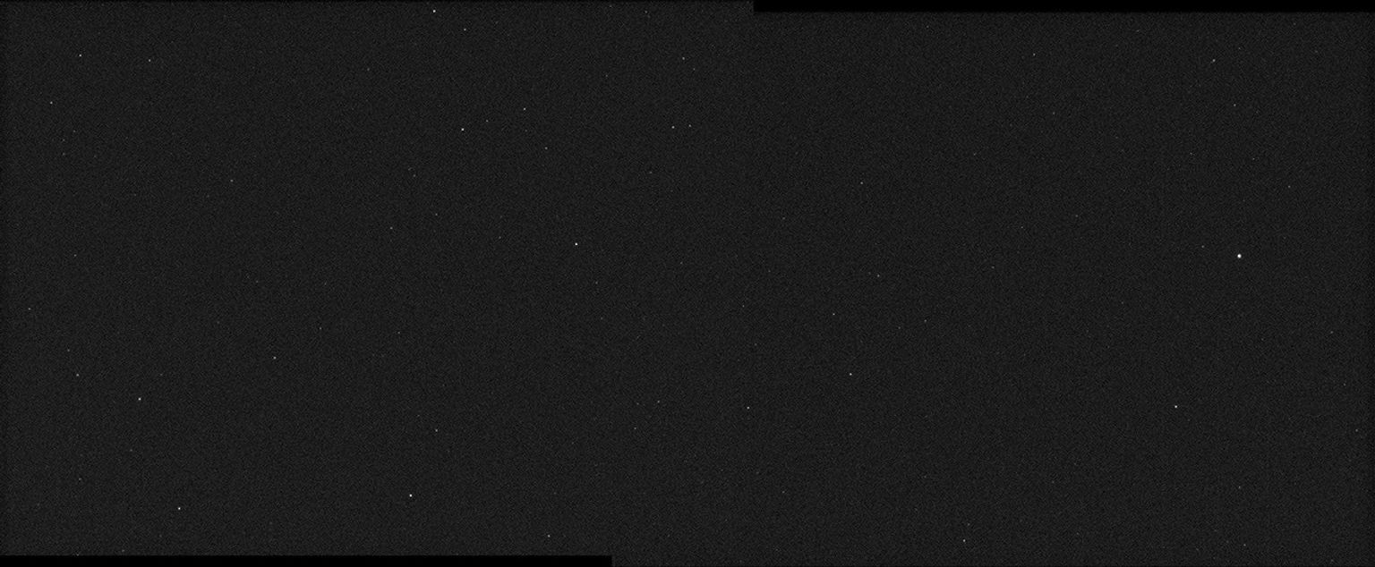 This mosaic was made from first light images acquired by both of the cameras on NASA's Psyche spacecraft on Dec. 4, 2023.