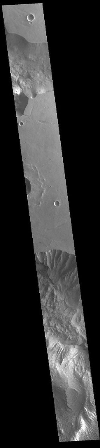 This image from NASA's Mars Odyssey shows part of two chasmatas &ndash; Hebes Chasma and Ophir Chasma.