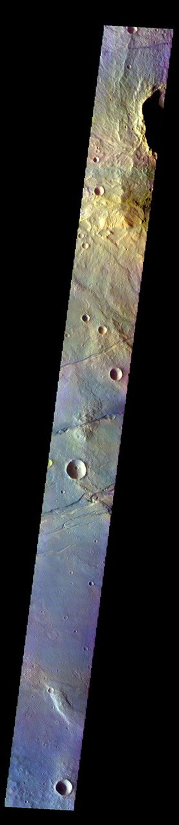 This image from NASA's Mars Odyssey shows part of Sirenum Fossae. The linear depressions in this VIS image are tectonic graben.
