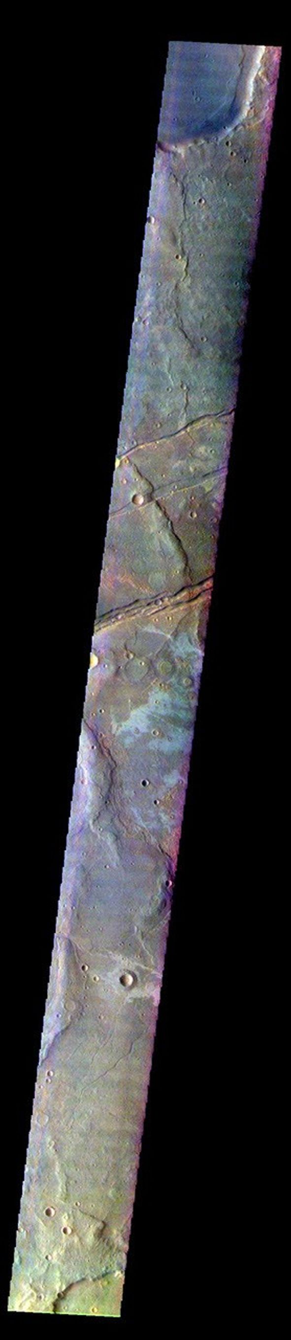 This image from NASA's Mars Odyssey shows part of Sirenum Fossae. The linear depressions in this VIS image are tectonic graben.