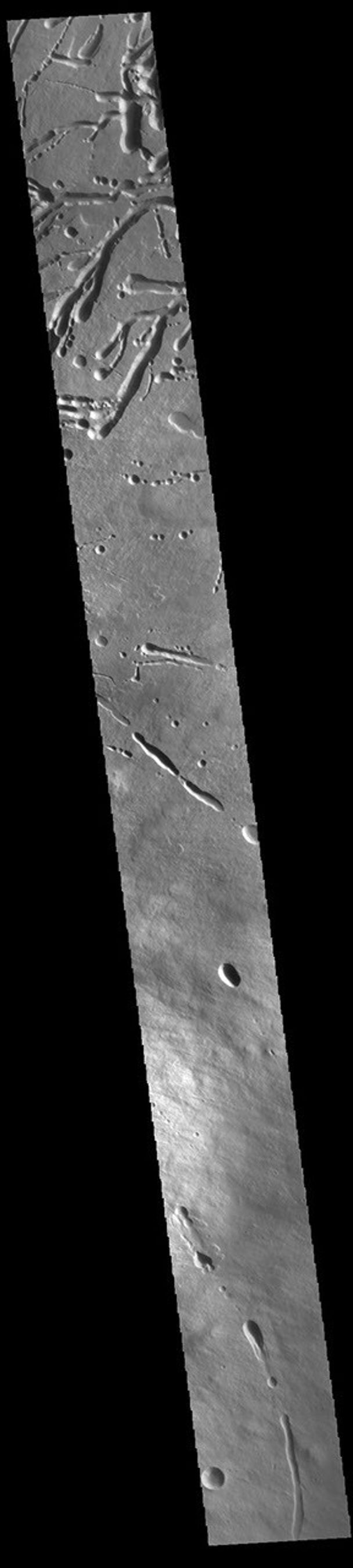 This image from NASA's Mars Odyssey shows a cross section of the eastern flank of Ascraeus Mons.