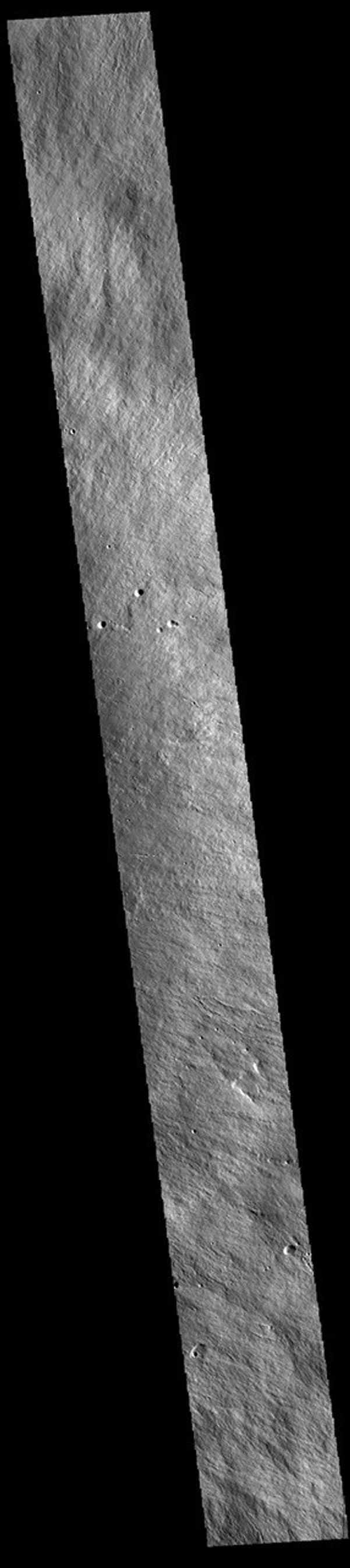 This image from NASA's Mars Odyssey shows the upper flank of Olympus Mons. Olympus Mons is the largest volcano in the solar system.