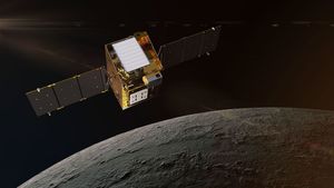 An artist's concept of a square, gold spacecraft with its solar panels extended orbiting Earth's Moon.