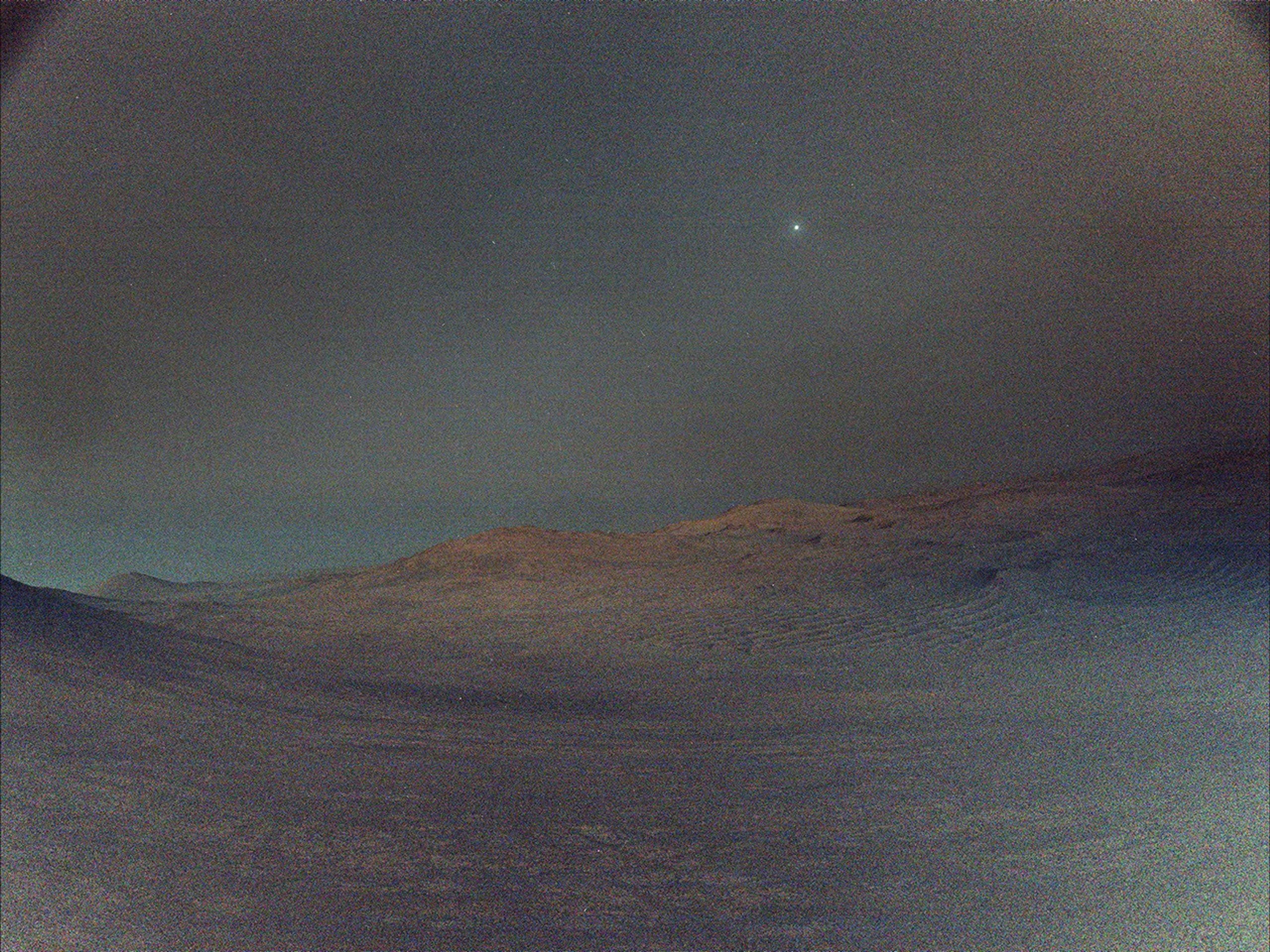 NASA's Perseverance rover captured this view of Deimos, the smaller of Mars' two moons, shining in the sky at 4:27 a.m. local time on March 1, 2025.