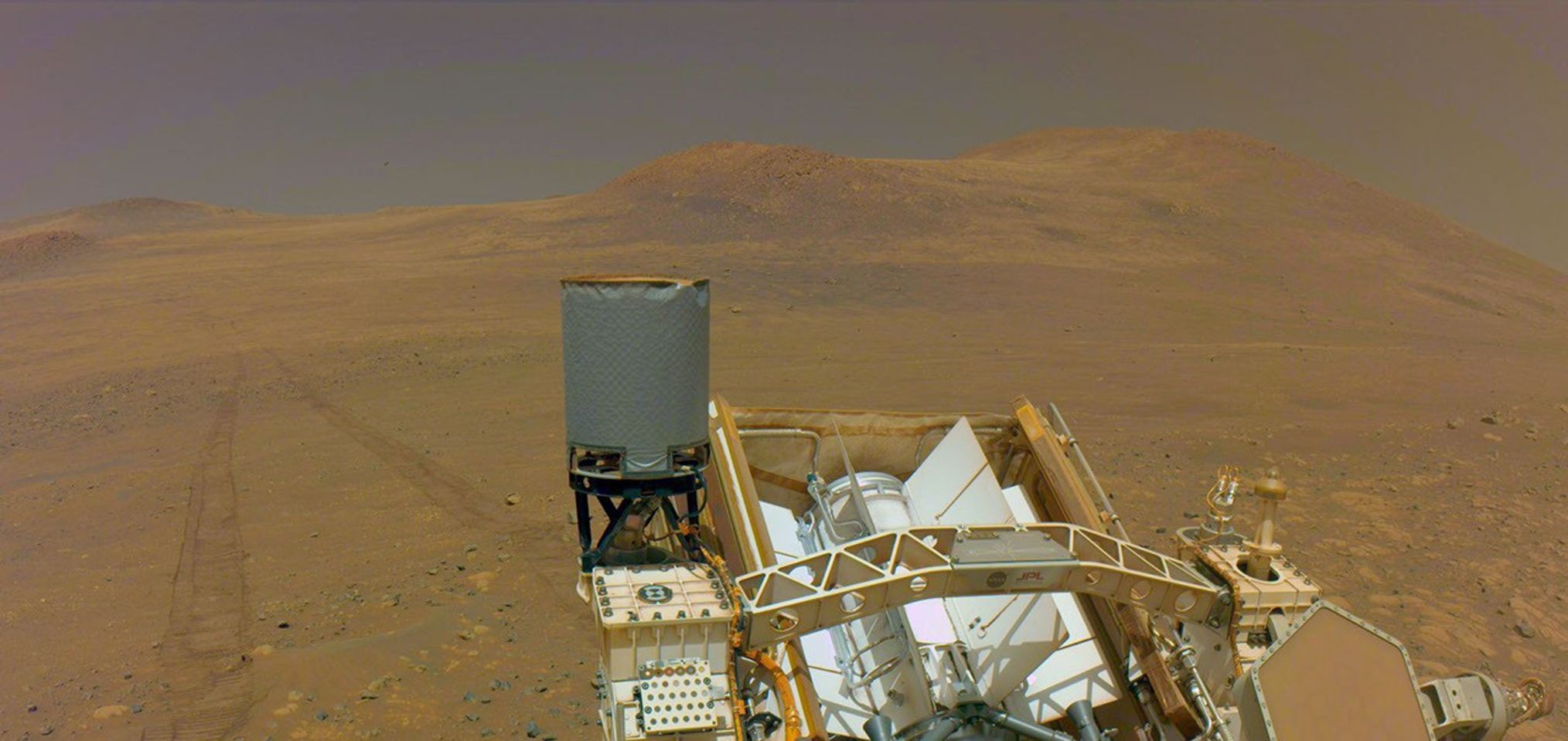 One of the navigation cameras on NASA's Perseverance captured the rover's tracks coming from an area called Witch Hazel Hill, on May 13, 2025.
