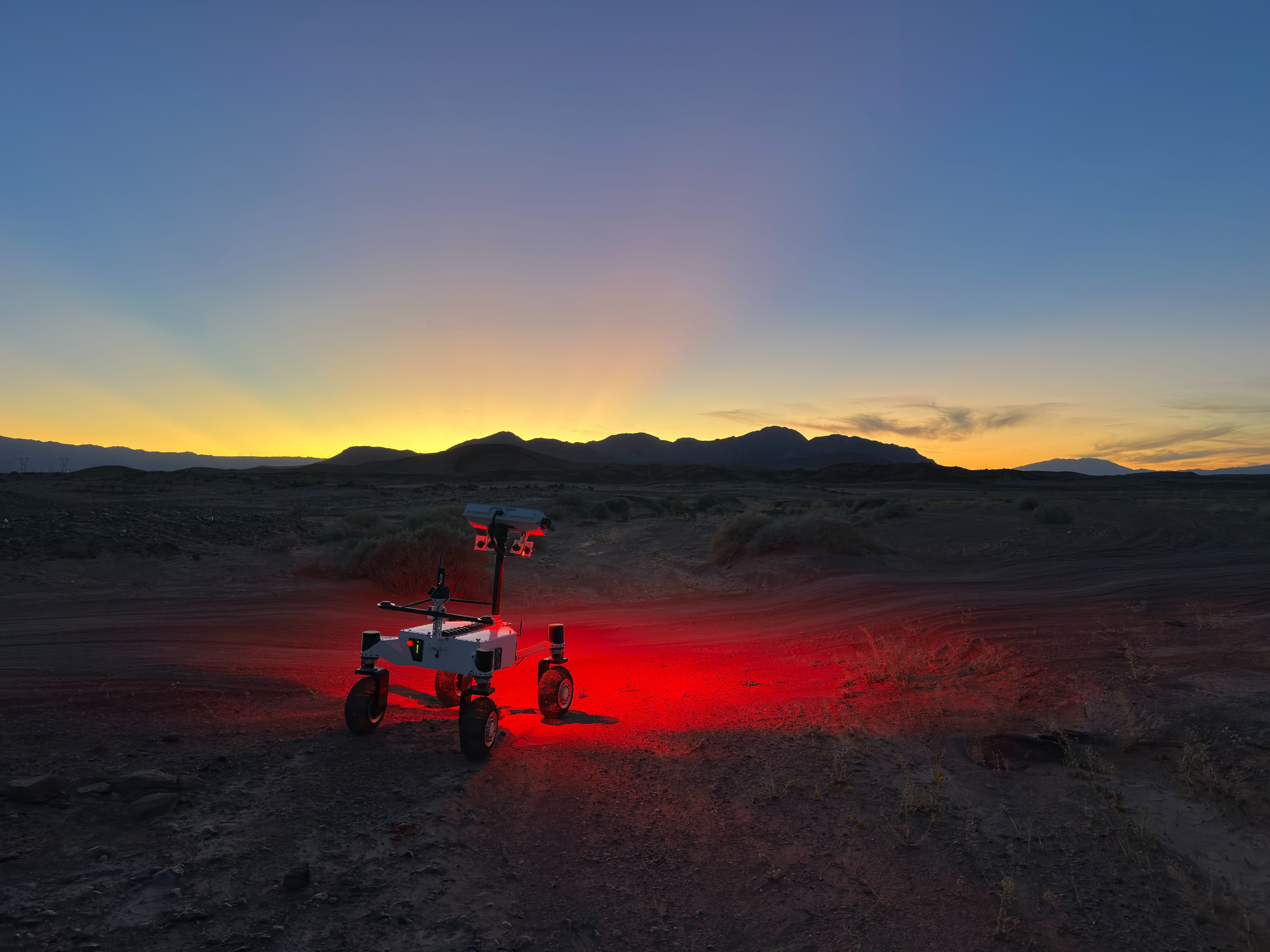 A prototype four-wheel rover developed at NASA’s Jet Propulsion Laboratory with advanced mobility and robotic autonomy capabilities trundled across the Colorado Desert near Plaster City, California, during a field test in March 2026.