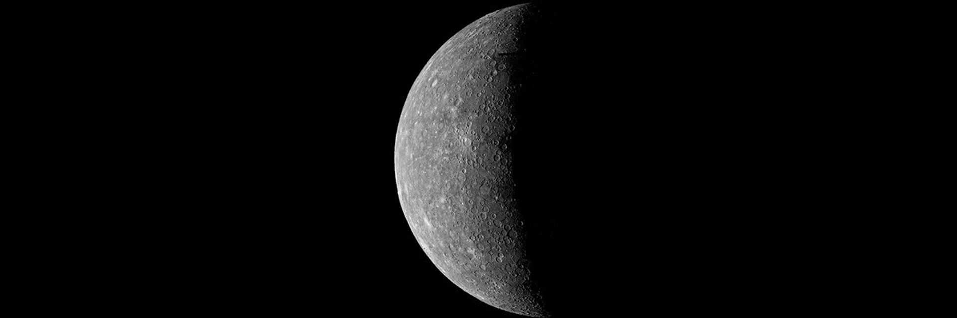 Gray planet Mercury against the darkness of space.