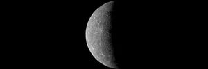 Gray planet Mercury against the darkness of space.