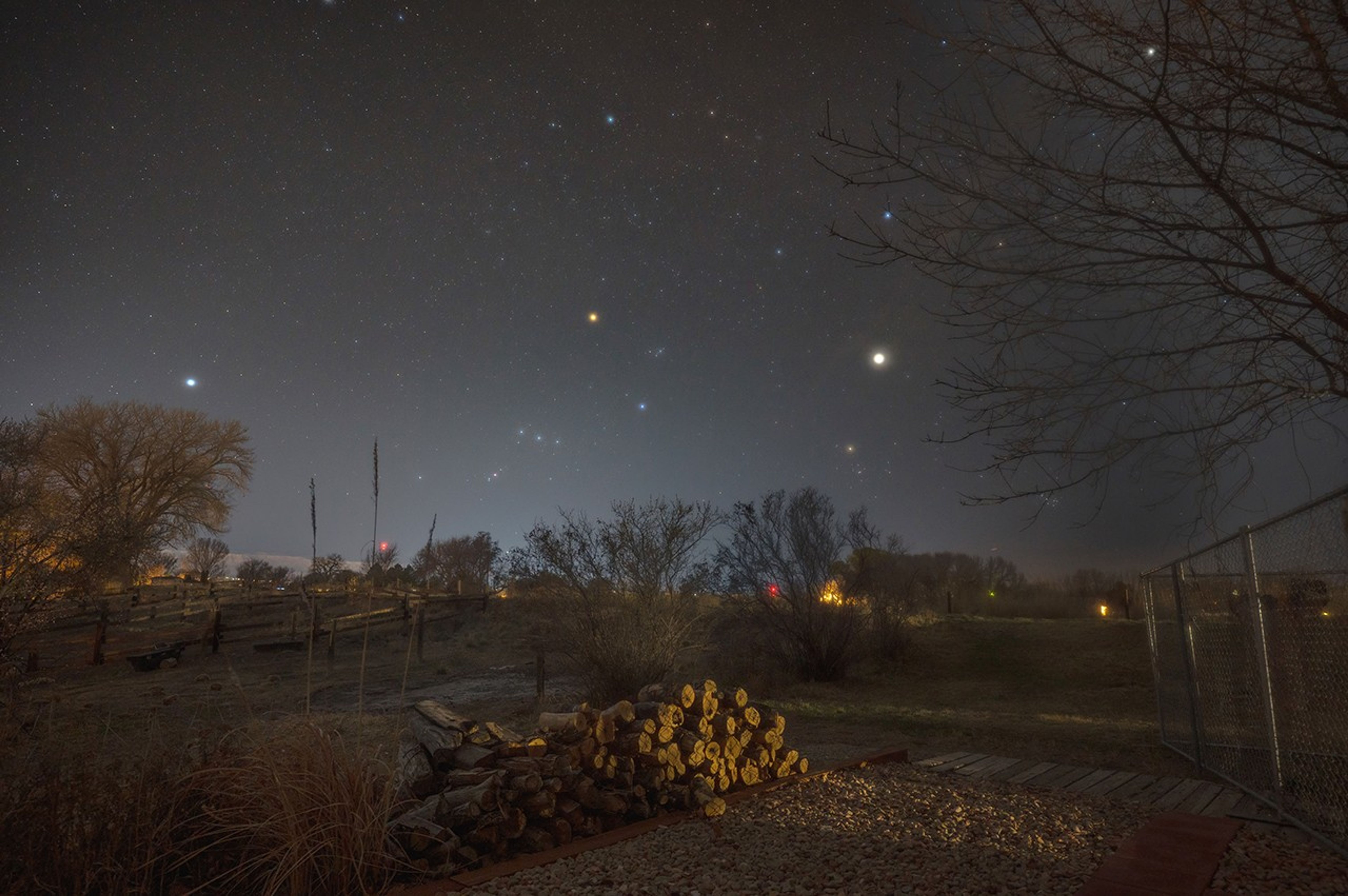 Night sky with stars and constellations visible.