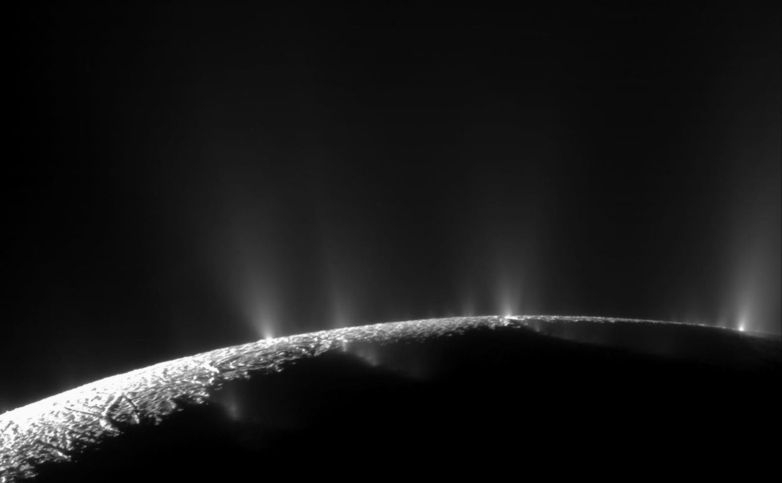 A plume sprays water ice and vapor from the south polar region of Saturn's moon Enceladus