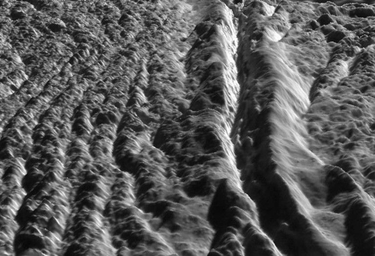 This perspective view of Damascus Sulcus was generated using high resolution images of Enceladus acquired in August 2008 at 12 to 30 meters (40 to 100 feet) resolution, together with a new topographic map of the region produced by Dr. Paul Schenk at the Lunar and Planetary Institute in Houston, TX.
