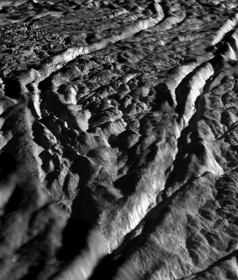 This perspective view of Baghdad Sulcus was generated using high resolution images of Enceladus acquired in August 2008 at 12 to 30 meters (40 to 100 feet) resolution, together with a new topographic map of the region produced by Dr. Paul Schenk (http://www.lpi.usra.edu/lpi/schenk/) at the Lunar and Planetary Institute in Houston, TX.