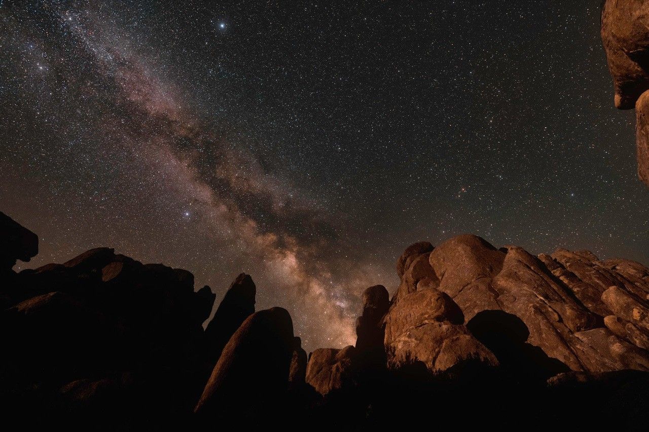 photo of the night sky including the Milky Way and the Summer Triangle asterism
