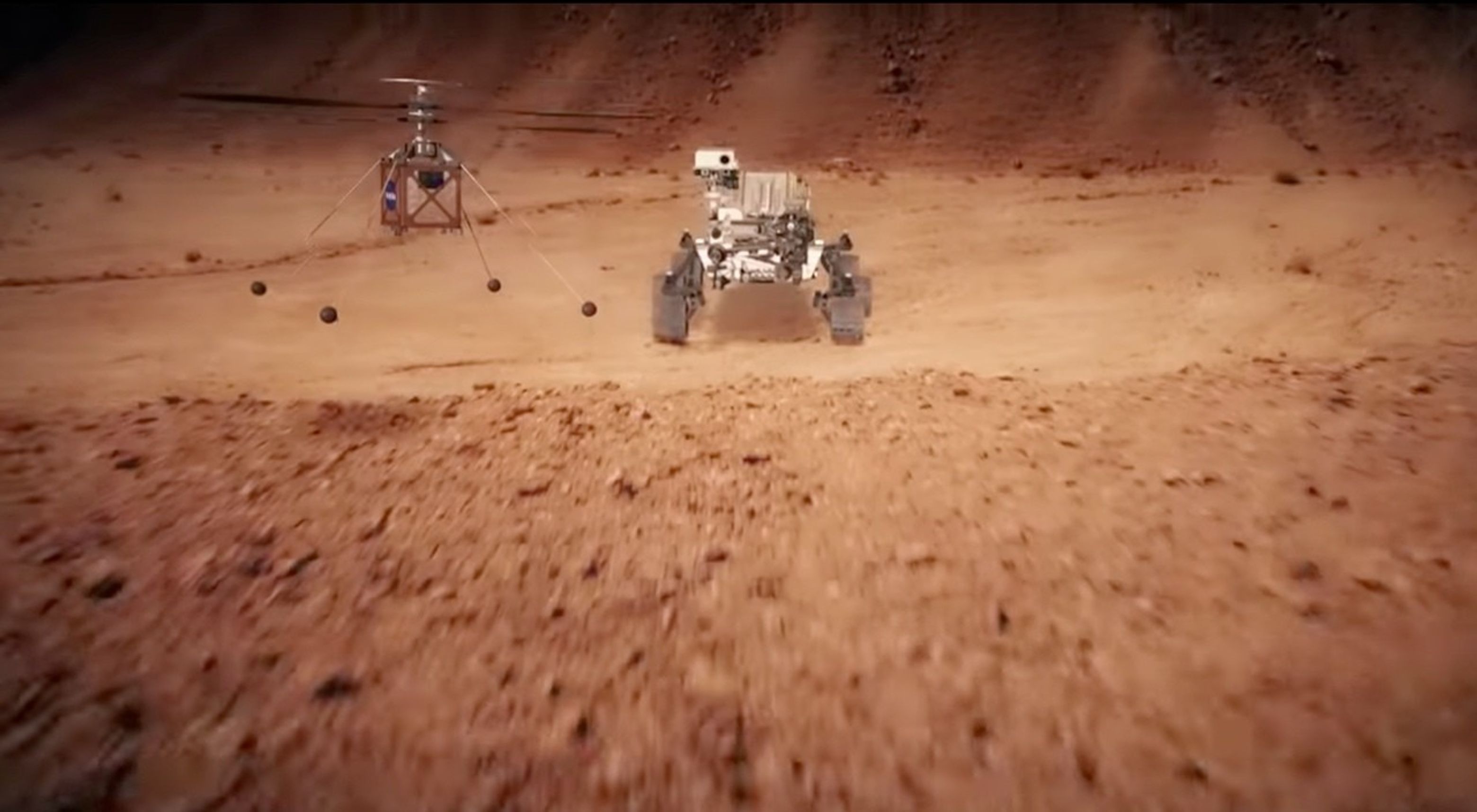 animation of helicopter flying near rover