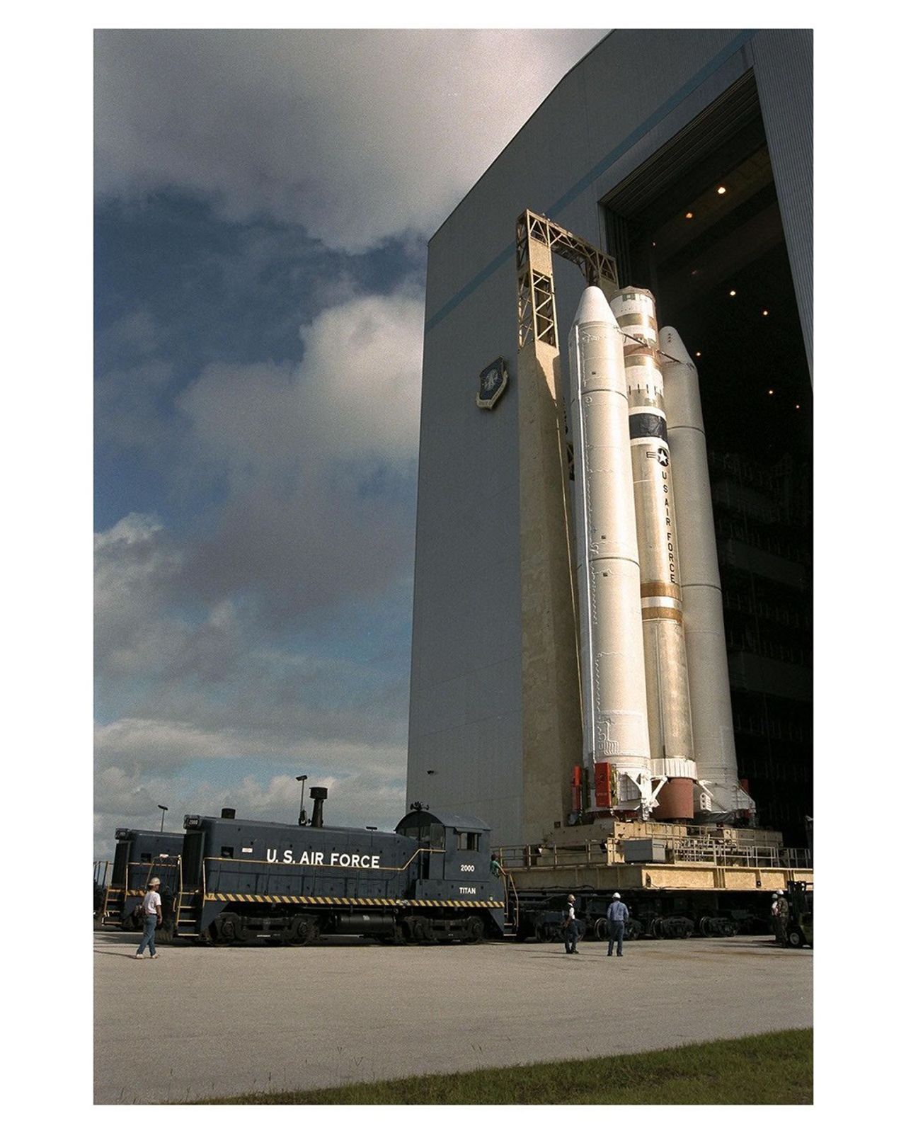 Color image of rocket at launch pad.
