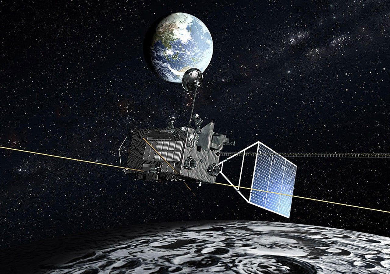 Spacecraft with Earth behind it and the Moon below