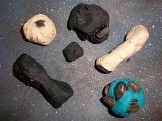 Six play dough balls of varying sizes and shapes are shown.