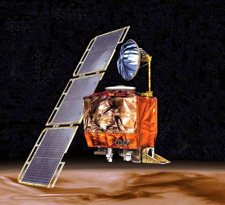 Spacecraft in orbit over Mars.