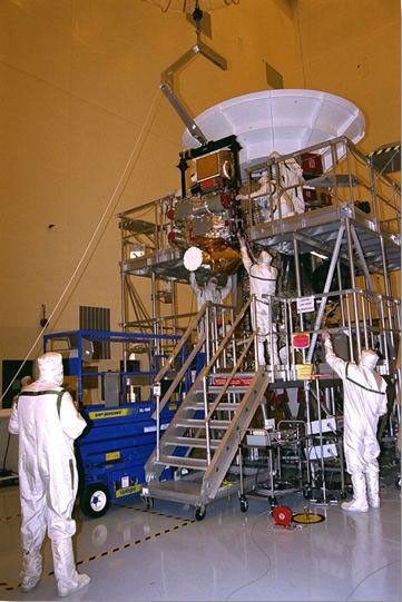 Engineers building a spacecraft.