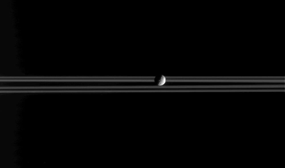 Mimas and Saturn's rings