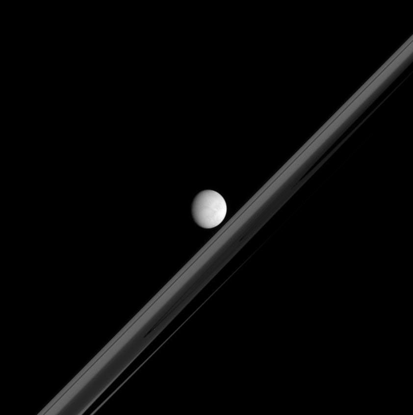Enceladus in front of Saturn's Ring