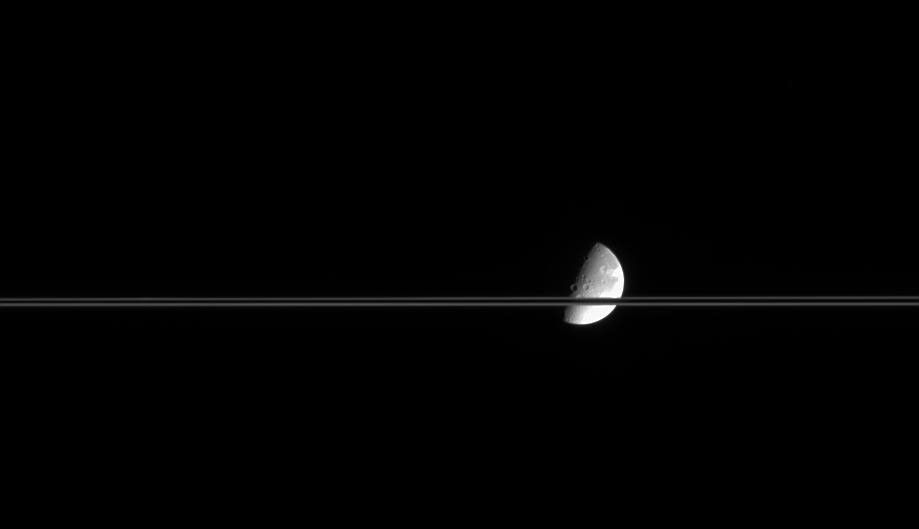Dione and a portion of Saturn's rings