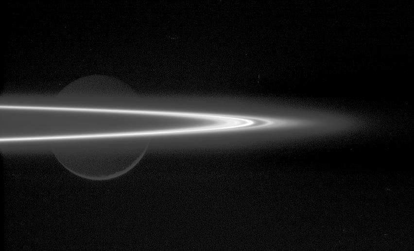 Saturn's F ring and moon Rhea