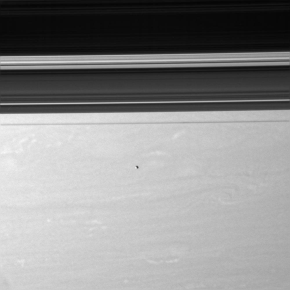 Epimetheus floats above Saturn's swirling skies