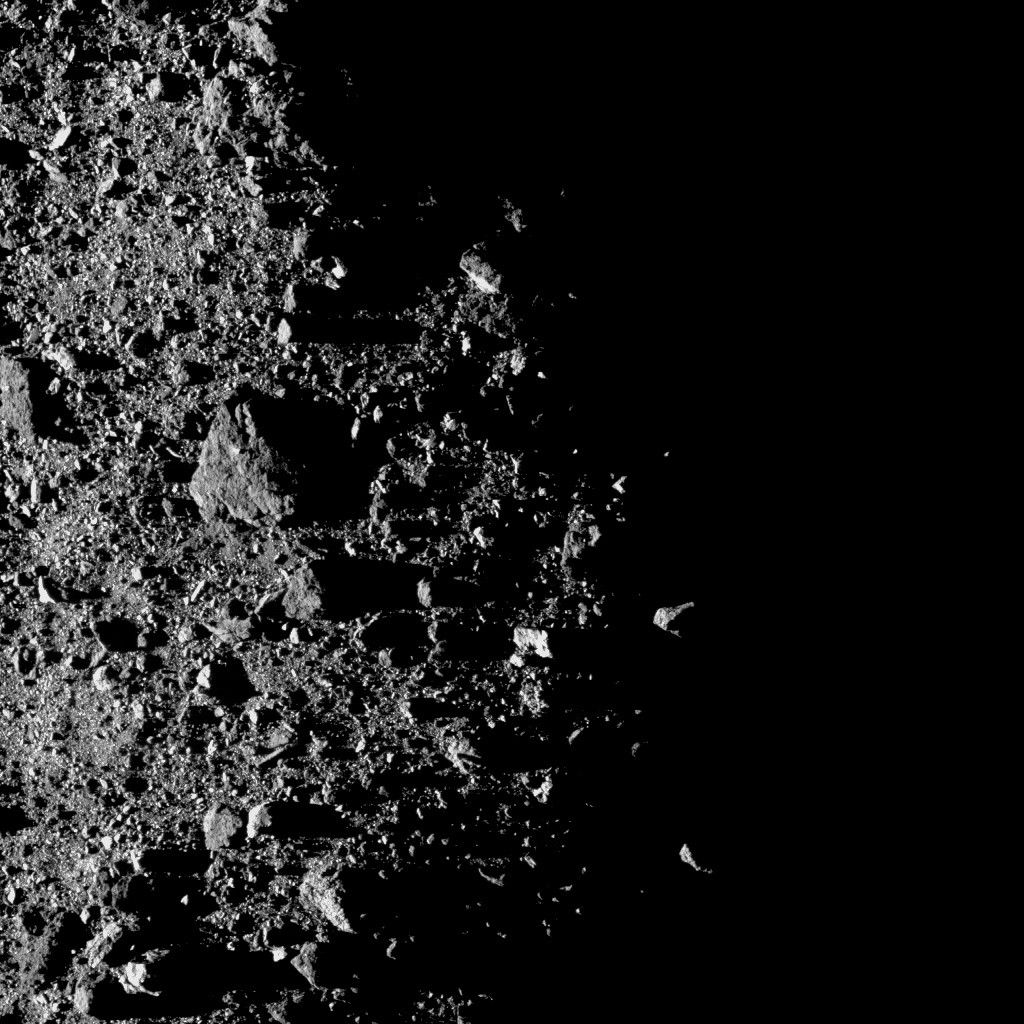 rocky surface half in shadow