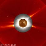 The Sun and its atmosphere, shown in a red, gray, and gold layers taken by NASA spacecraft