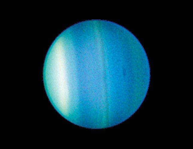 This 2006 image taken by the Hubble Space Telescope shows bands and a new dark spot in Uranus' atmosphere.