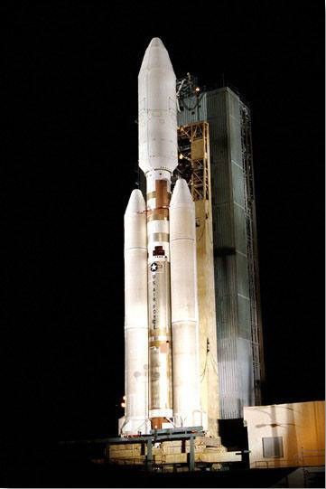 Color image of rocket on launchpad.