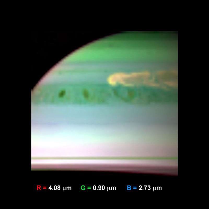 This false-color infrared image, obtained by NASA's Cassini spacecraft, shows clouds of large ammonia ice particles dredged up by a powerful storm in Saturn's northern hemisphere.