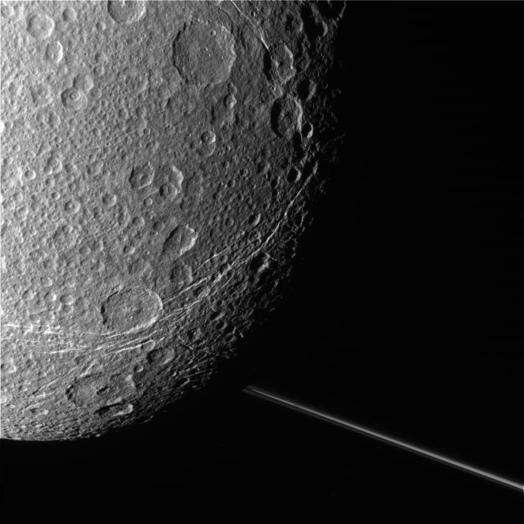 These raw, unprocessed images of Saturn's moon Dione were taken on Dec. 12, 2011, by NASA's Cassini spacecraft.