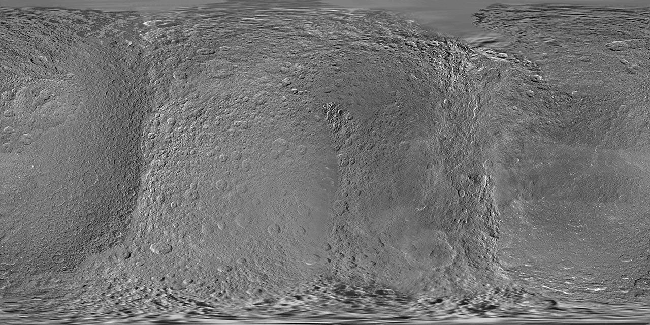 This global digital map of Rhea was created using data taken during Cassini and Voyager spacecraft flybys.