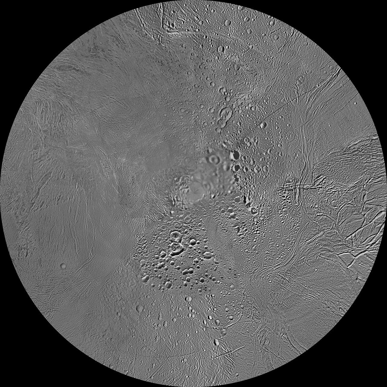 The northern and southern hemispheres of Enceladus are seen in these polar stereographic maps, mosaicked from the best-available Cassini clear-filter images.