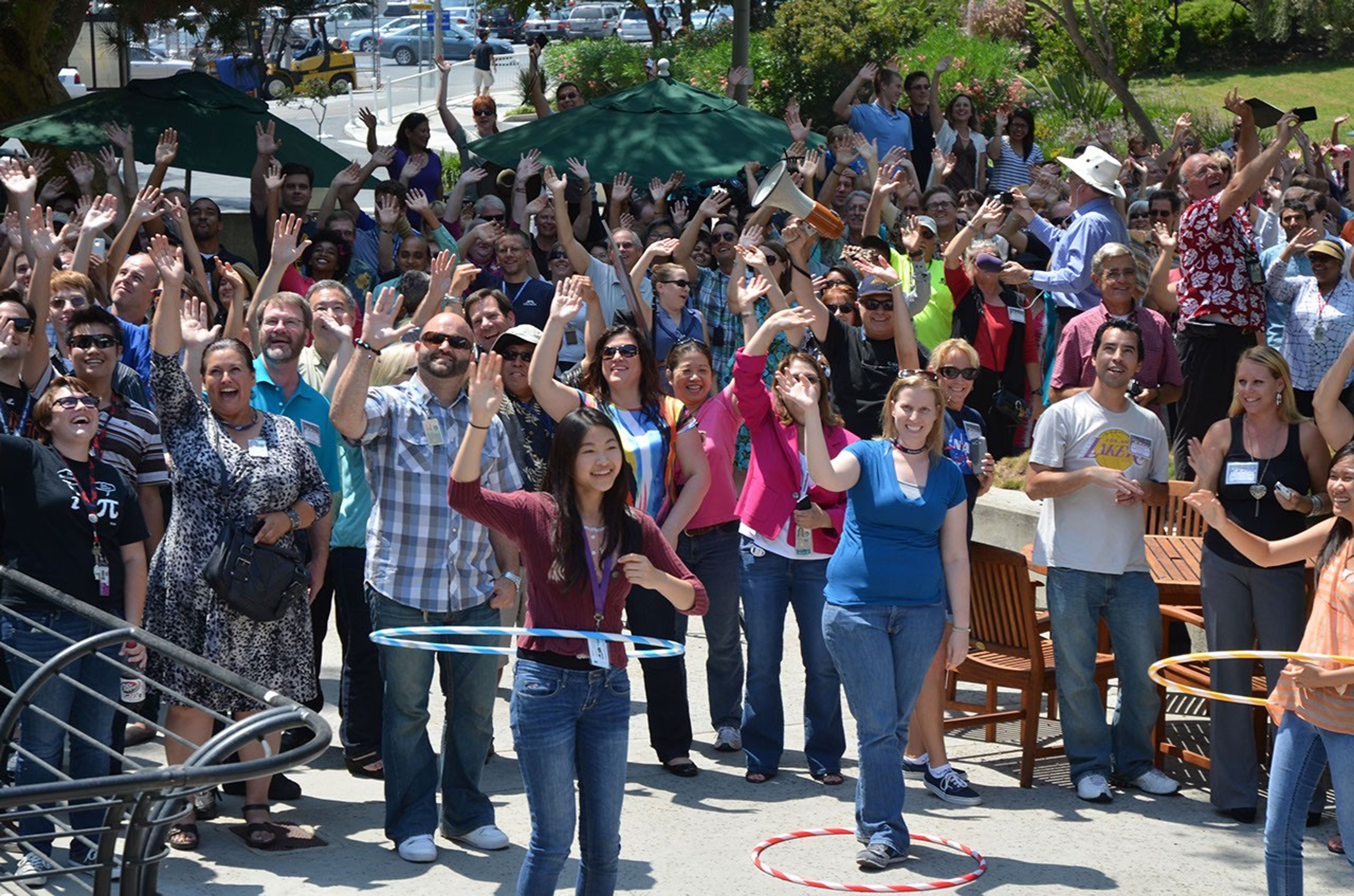 As NASA's Cassini spacecraft turned its imaging cameras to Earth, scientists, engineers and visitors at NASA's Jet Propulsion Laboratory, Pasadena, Calif., gathered to wave at our robotic photographer in the Saturn system on July 19, 2013.