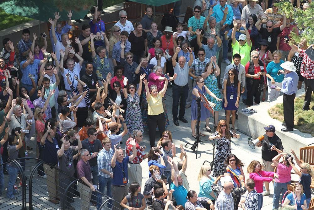 As NASA's Cassini spacecraft turned its imaging cameras to Earth, some 200 engineers, scientists and visitors at NASA's Jet Propulsion Laboratory, Pasadena, Calif., waved at our robotic photographer in the Saturn system on July 19, 2013.