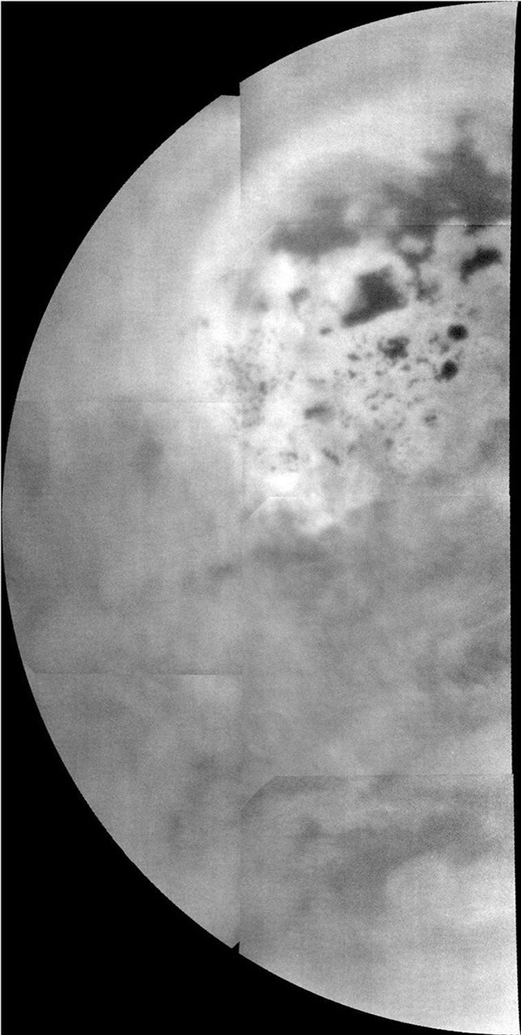 This mosaic, made from near-infrared images of Titan obtained by Cassini's imaging science subsystem, shows a view from the north pole (upper middle of mosaic) down to near the equator at the bottom.