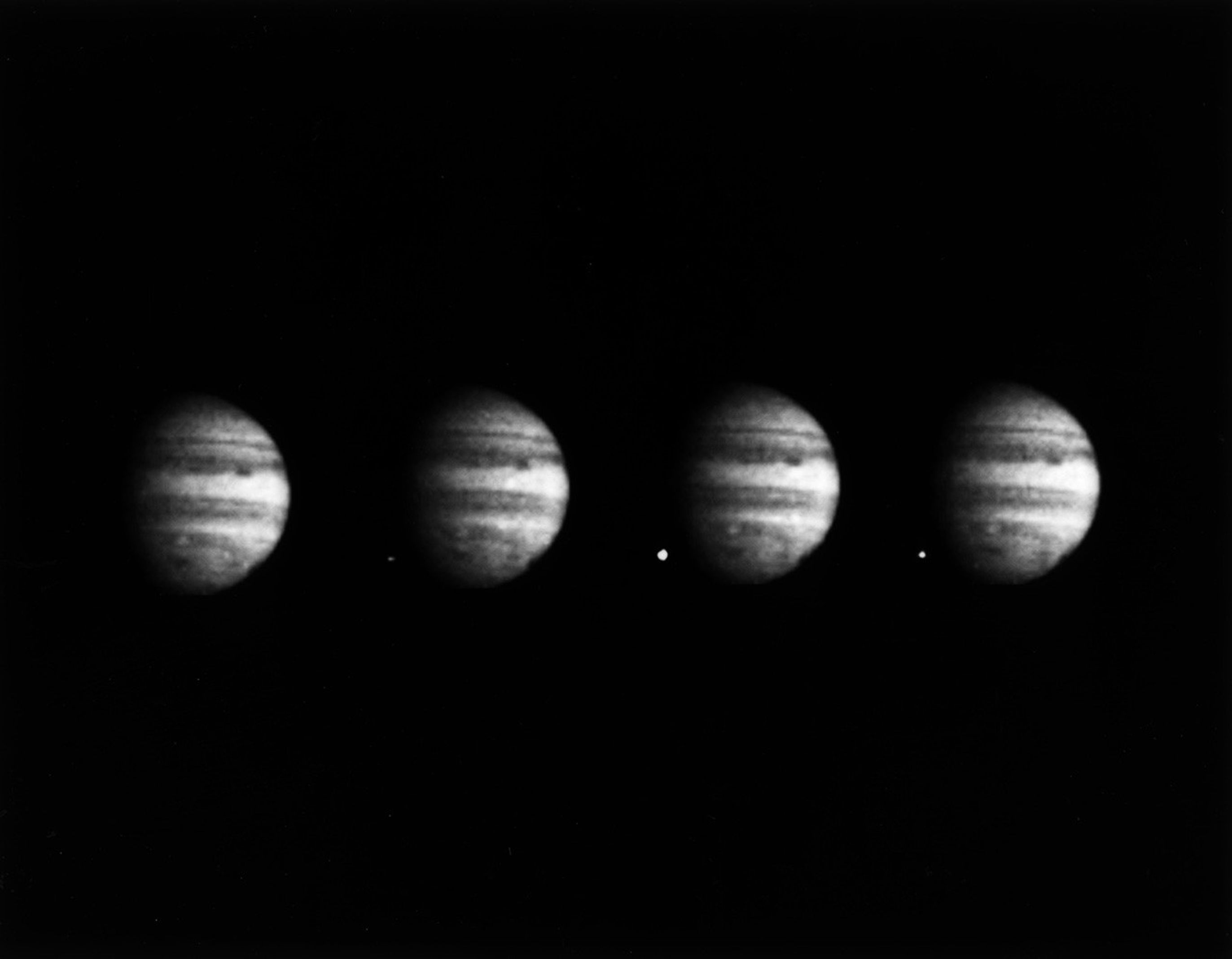 Bright impact of comet fragment on Jupiter. The flash is about as large as Earth.
