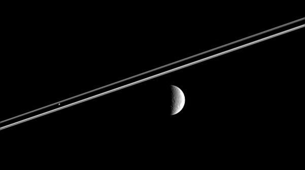 Rhea, Saturn's rings, and Pandora