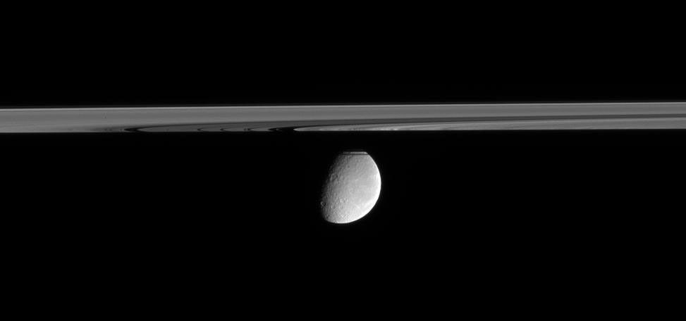 
			Rhea Beyond the Rings - NASA Science			