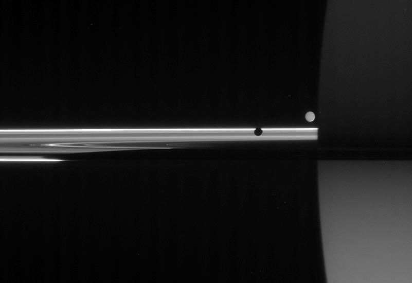 Saturn, its rings, Mimas and Enceladus