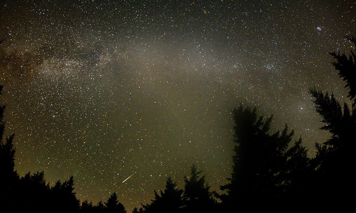 In this 30 second exposure, a meteor streaks across the sky during the annual Perseid meteor shower Friday, August 12, 2016 in Spruce Knob, West Virginia.