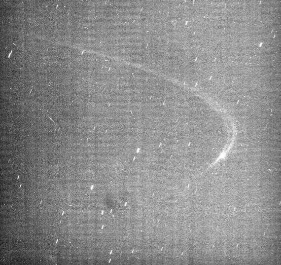 A faint arc of material orbiting with Saturn's small moon Anthe