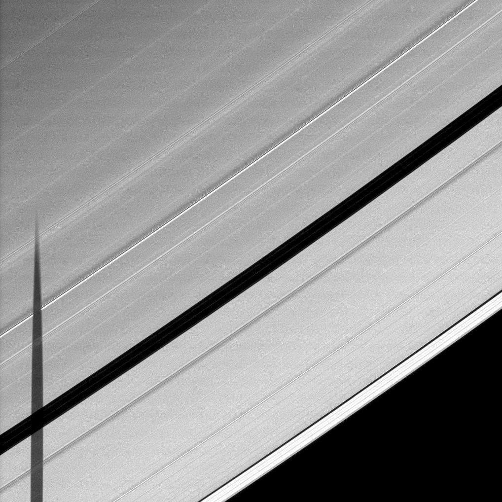 the shadow of the moon Janus is cast across the Encke Gap