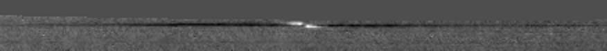NASA’s Cassini spacecraft captured a propeller-shaped disturbance in one of Saturn's rings created by a moon that is too small to be seen here.