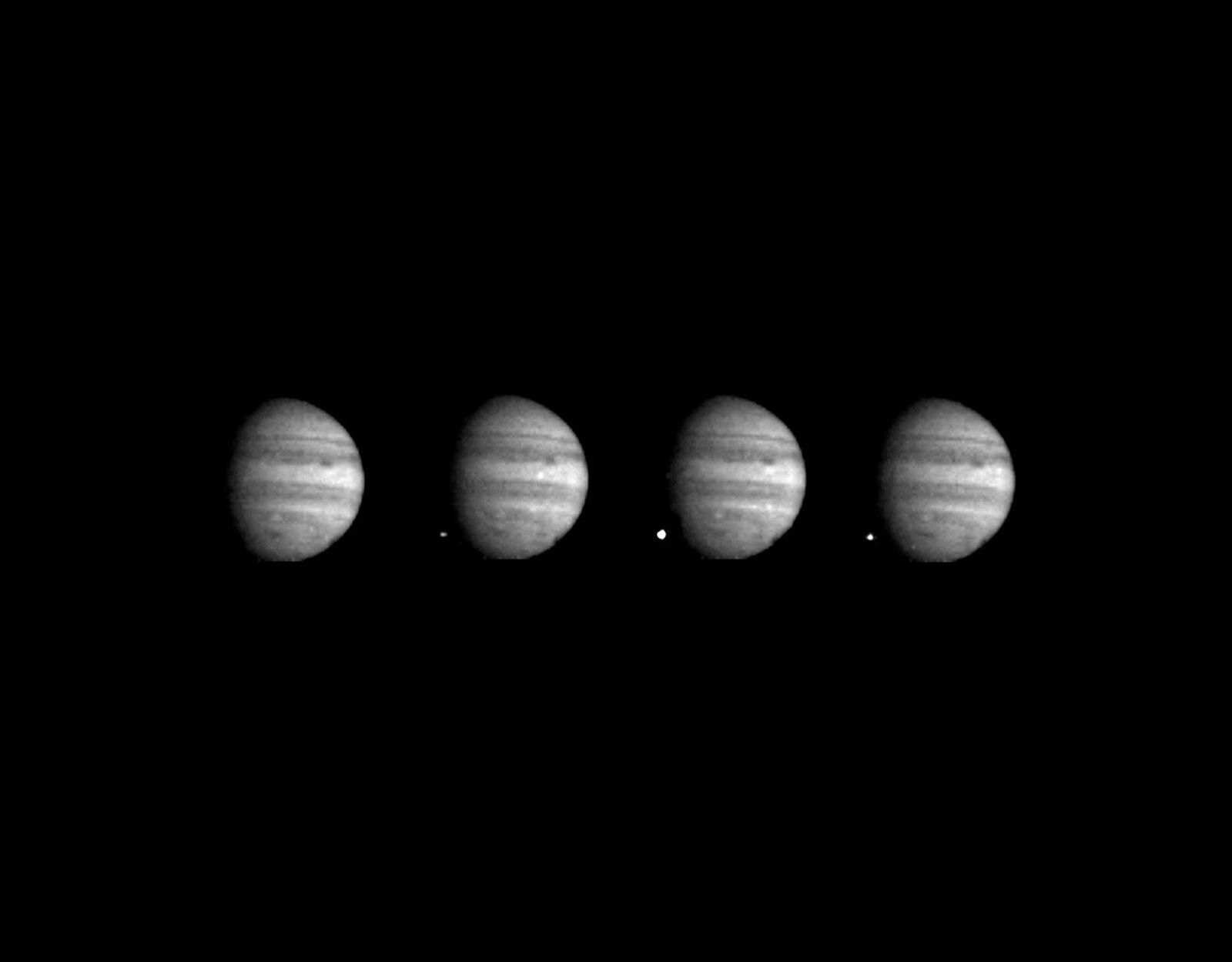 These four images of Jupiter and the luminous night-side impact of fragment W of Comet Shoemaker-Levy 9 were taken by the Galileo spacecraft on July 22, 1994.