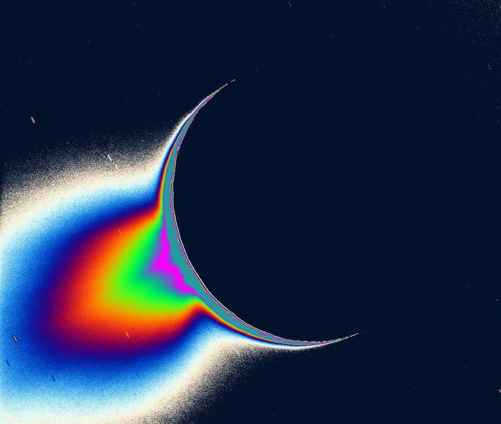 This NASA Cassini image of Saturn's moon Enceladus backlit by the sun shows the fountain-like sources of the fine spray of material that towers over the south polar region.
