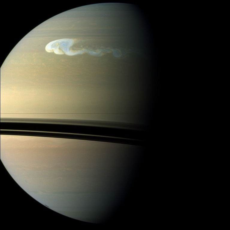 NASA's Cassini spacecraft captures a composite near-true-color view of the huge storm churning through the atmosphere in Saturn's northern hemisphere.